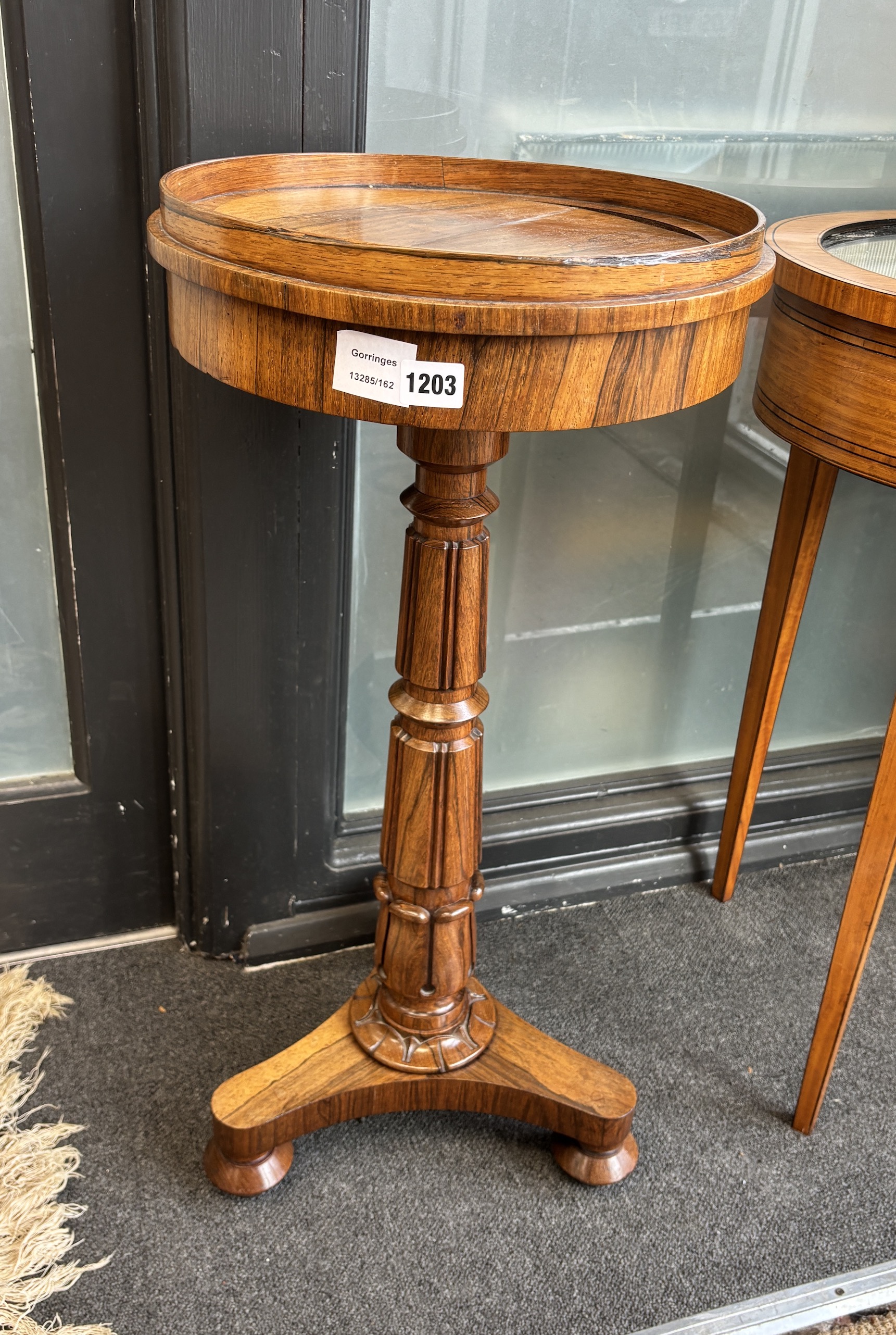 A William IV rosewood jardiniere, diameter 36cm, height 76cm